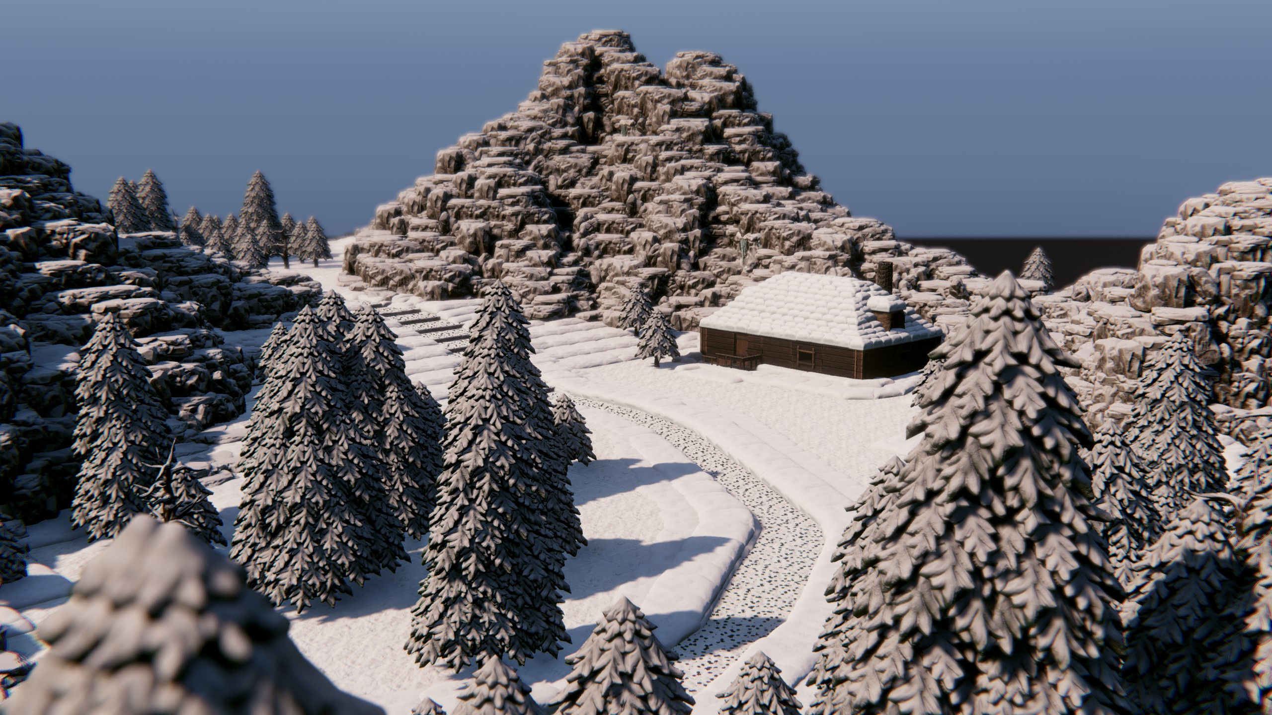The cabin seen past snow-laden pine trees and a winding path
