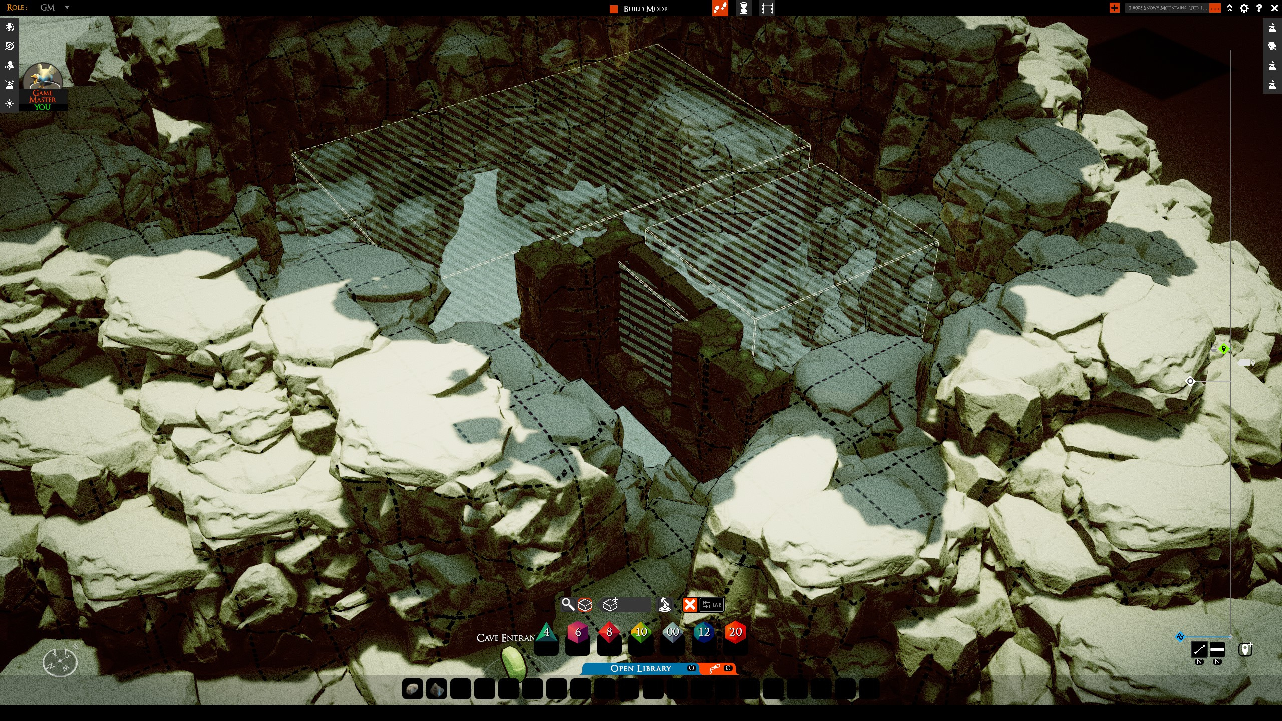 The secret cave outlined by its hide volume among snow-covered rocks