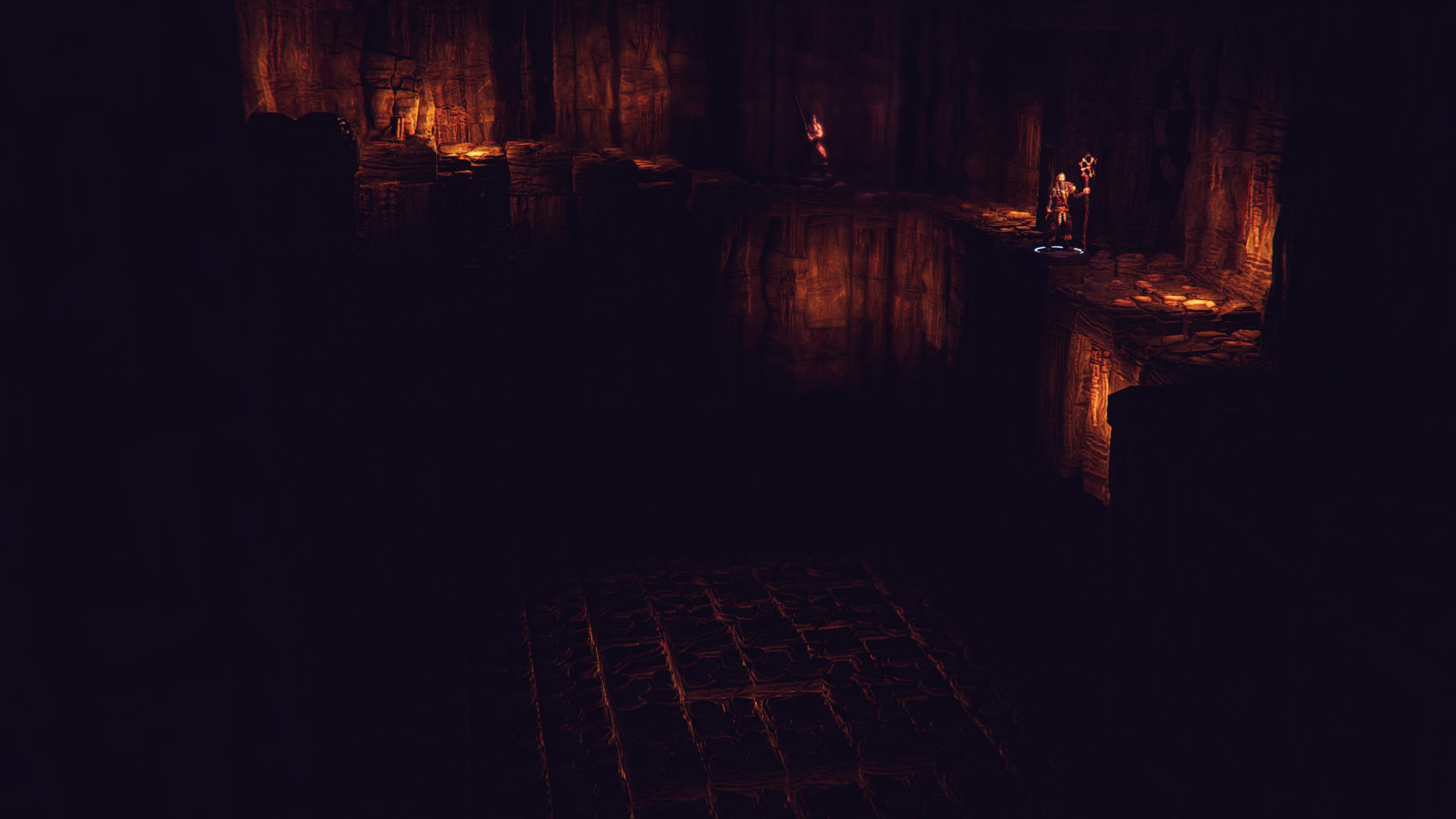 A dark cavern passage lit by flickering torches