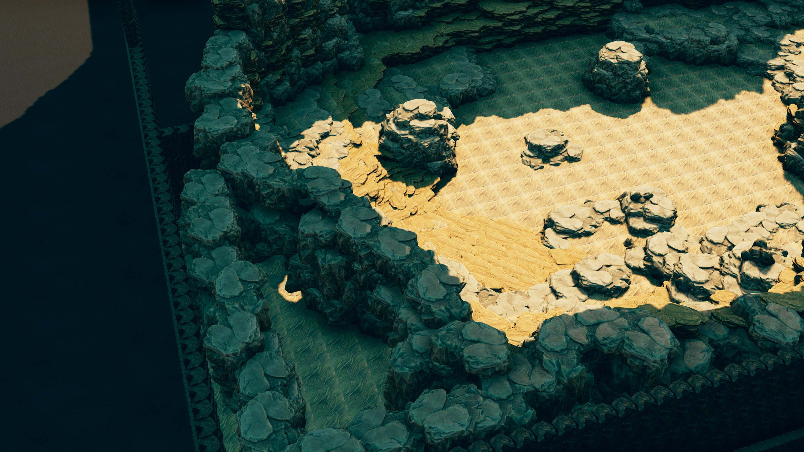 A wide open sandy arena with scattered boulders for big boss fights