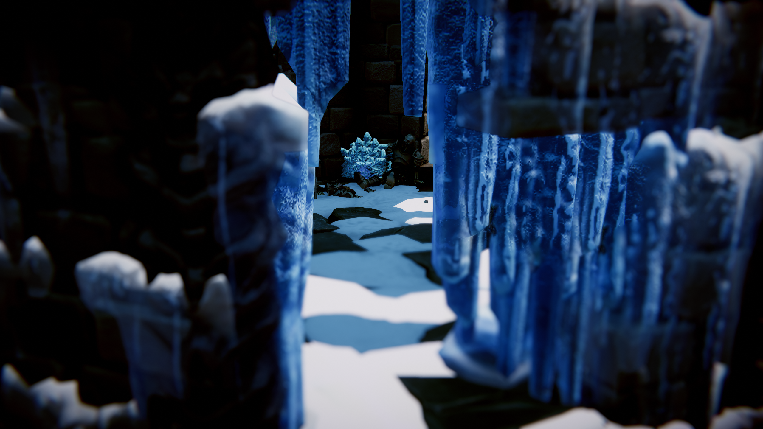 Massive blue icicles framing a glowing crystal deep in the cave